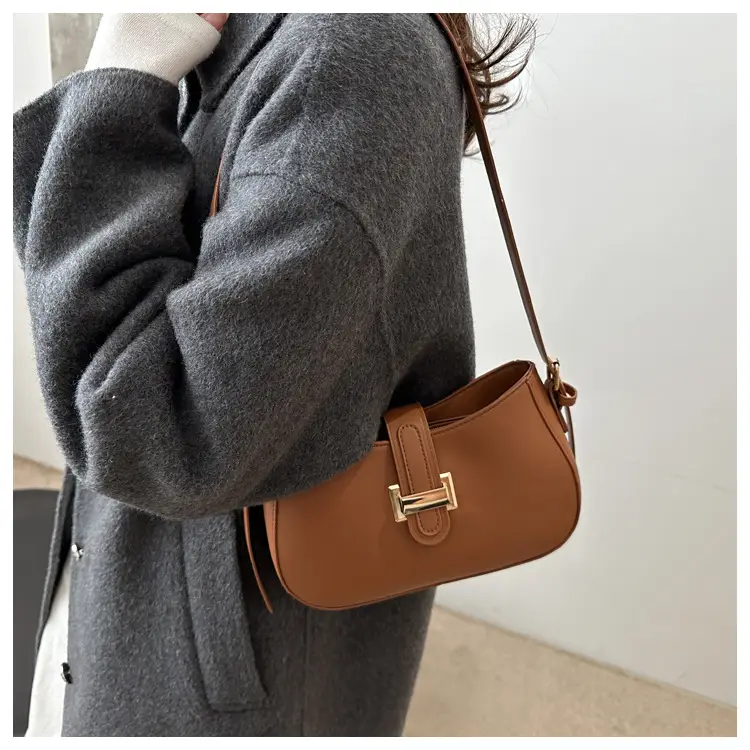 Black Women's Crossbody Bag with Gold Logo - Image 6