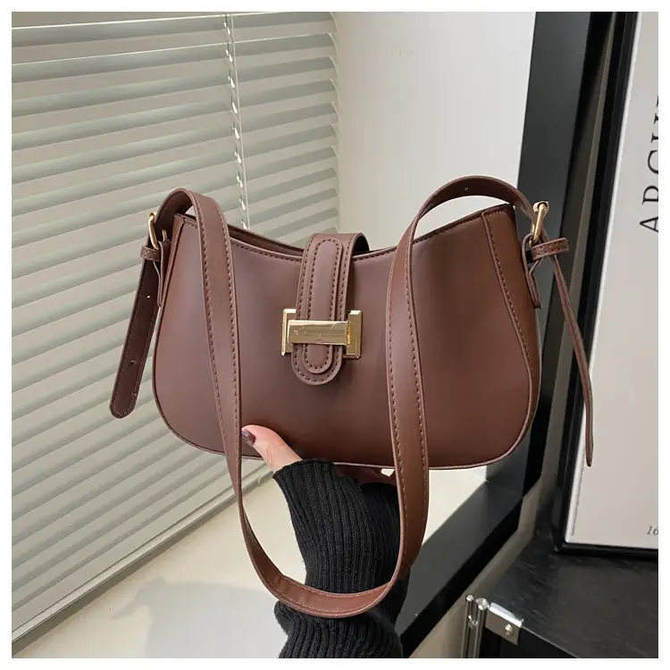 Black Women's Crossbody Bag with Gold Logo - Image 8
