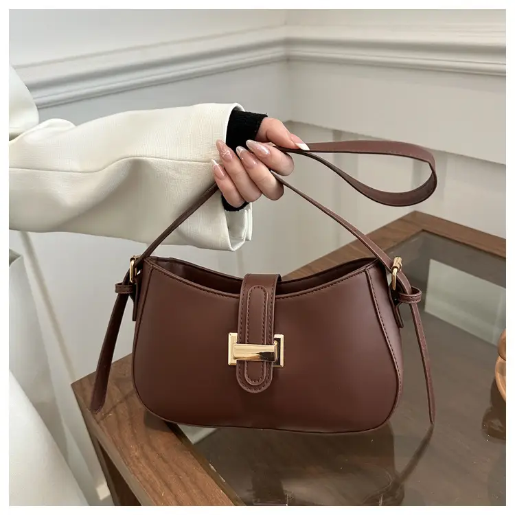 Black Women's Crossbody Bag with Gold Logo — feature 23