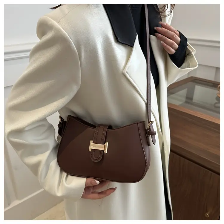 Black Women's Crossbody Bag with Gold Logo — feature 28