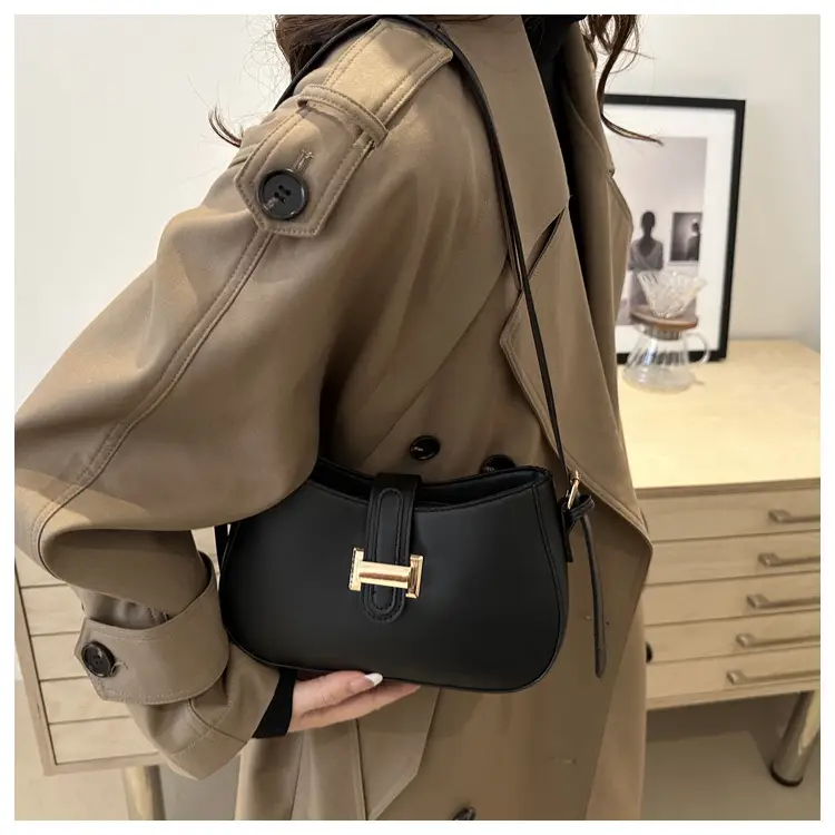 Black Women's Crossbody Bag with Gold Logo — feature 32