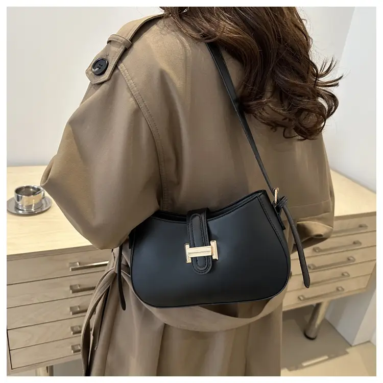 Black Women's Crossbody Bag with Gold Logo — feature 35