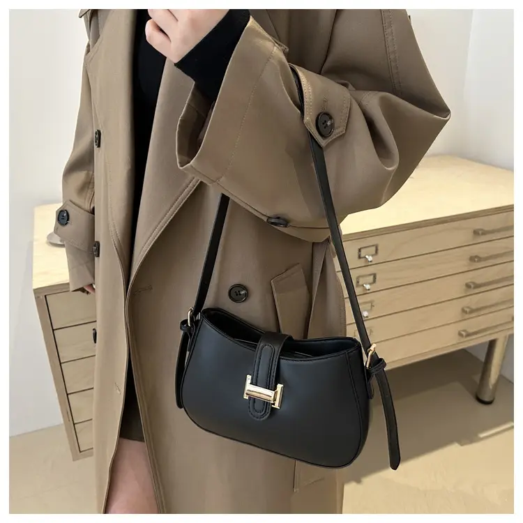 Black Women's Crossbody Bag with Gold Logo — feature 36
