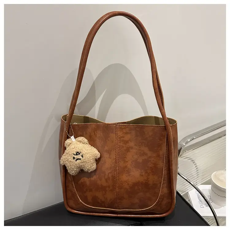 Brown Leather Shoulder Tote Bag with Teddy Bear Charm — feature 9