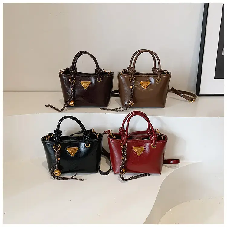 Women's Brown Leather Bucket Bag with Chain Strap — feature 1