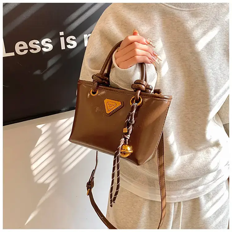 Women's Brown Leather Bucket Bag with Chain Strap — feature 17