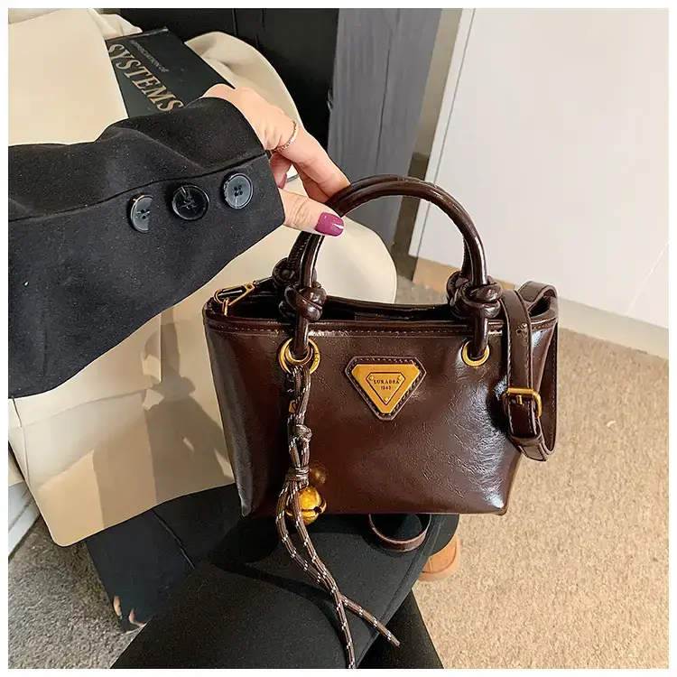 Women's Brown Leather Bucket Bag with Chain Strap — feature 27