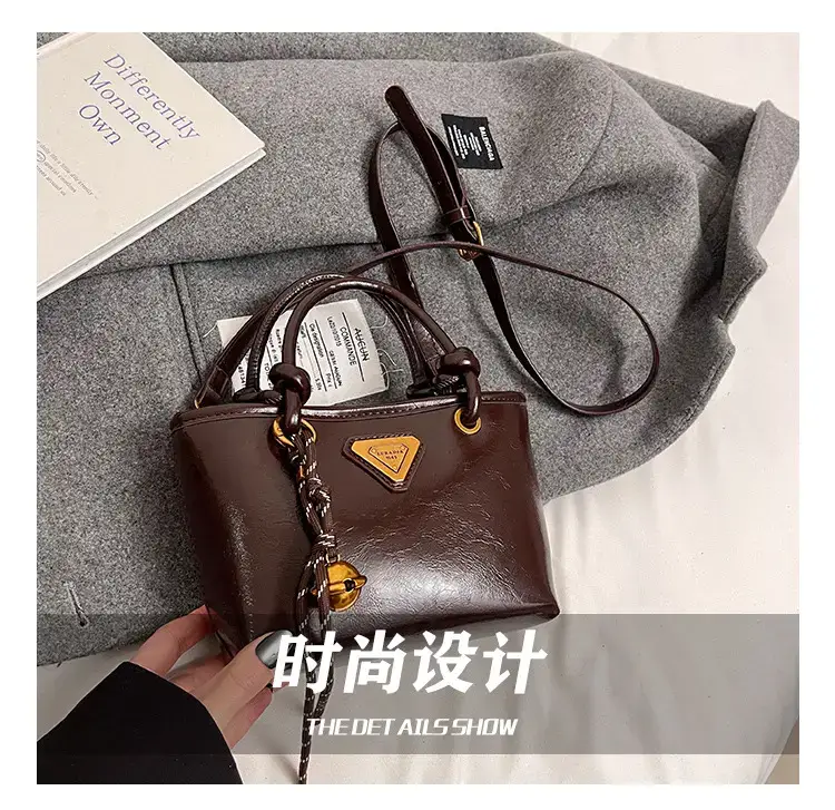 Women's Brown Leather Bucket Bag with Chain Strap — feature 3