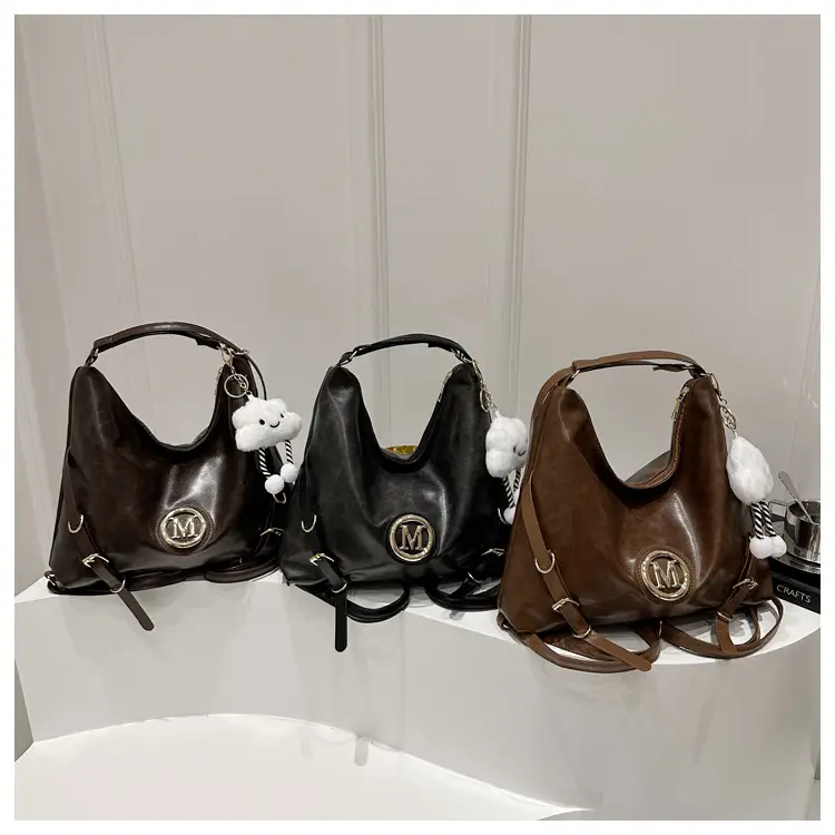 Women's Brown ML Logo Shoulder Bag with Cloud Accent — feature 9