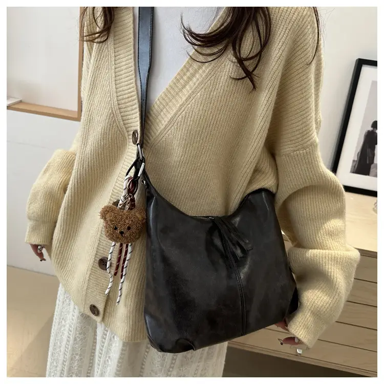 Black Textured Shoulder Tote Bag with Charm — feature 11
