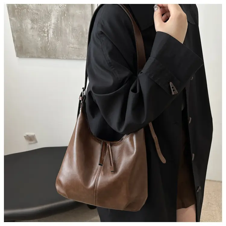 Black Textured Shoulder Tote Bag with Charm — feature 13