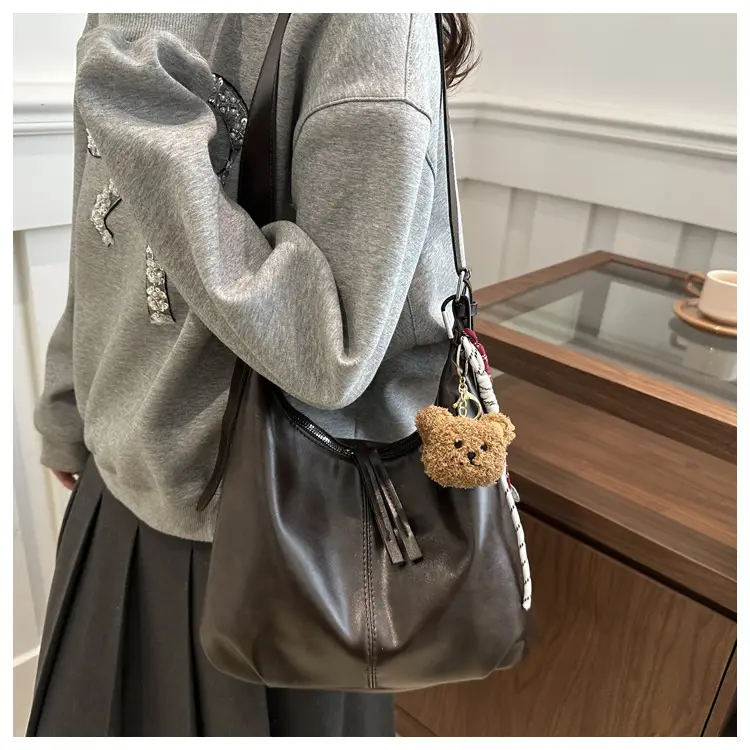 Black Textured Shoulder Tote Bag with Charm — feature 14