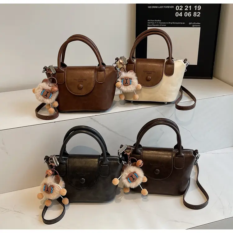 Women's Black Leather Shoulder Bag with Cute Pom Pom Charm — feature 16