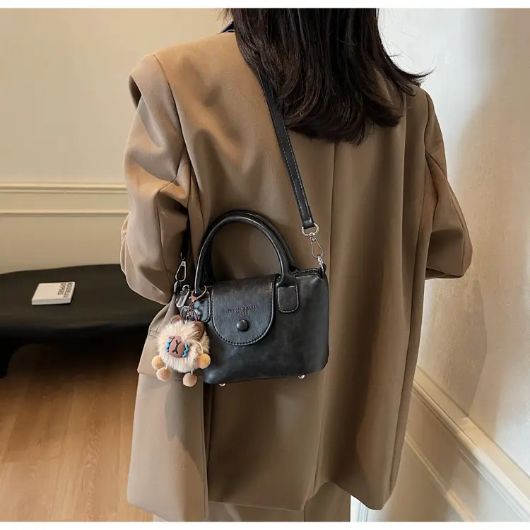 Women's Black Leather Shoulder Bag with Cute Pom Pom Charm — feature 17