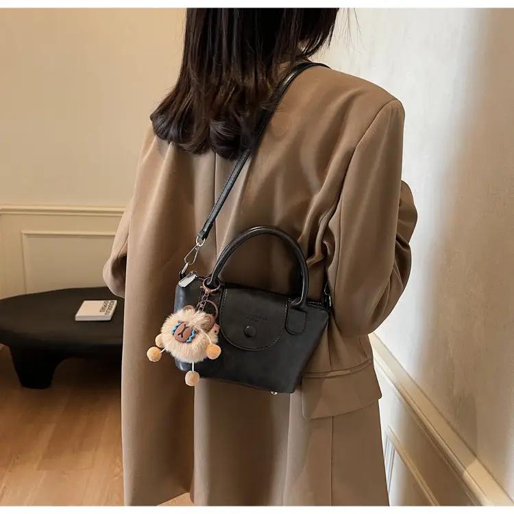 Women's Black Leather Shoulder Bag with Cute Pom Pom Charm — feature 18