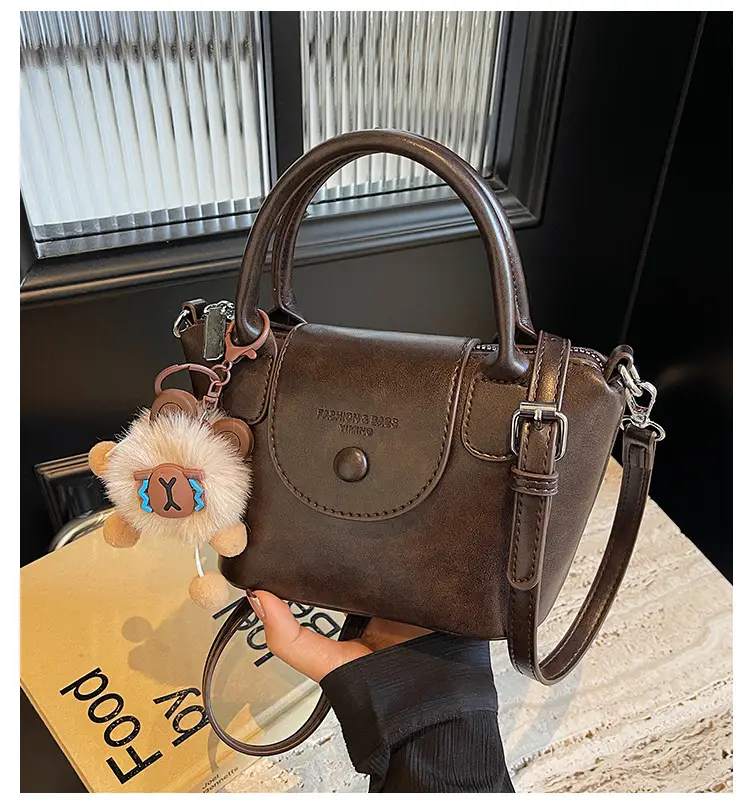 Women's Black Leather Shoulder Bag with Cute Pom Pom Charm — feature 2