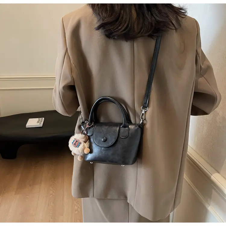 Women's Black Leather Shoulder Bag with Cute Pom Pom Charm — feature 21