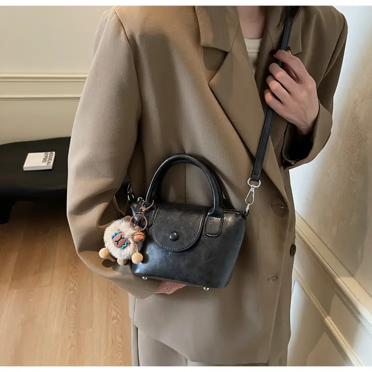 Women's Black Leather Shoulder Bag with Cute Pom Pom Charm — feature 24
