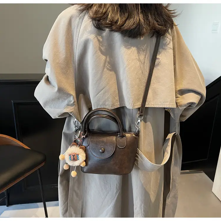 Women's Black Leather Shoulder Bag with Cute Pom Pom Charm — feature 32