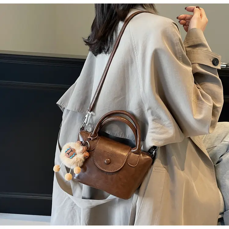 Women's Black Leather Shoulder Bag with Cute Pom Pom Charm — feature 37