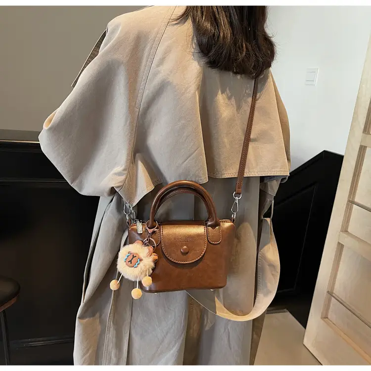 Women's Black Leather Shoulder Bag with Cute Pom Pom Charm — feature 39