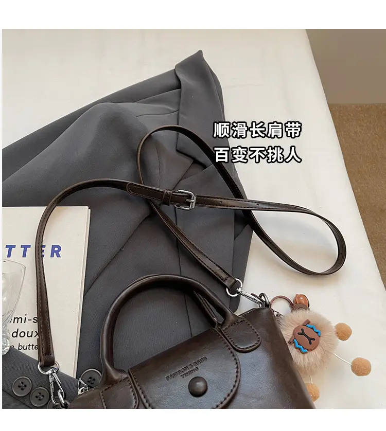Women's Black Leather Shoulder Bag with Cute Pom Pom Charm — feature 4