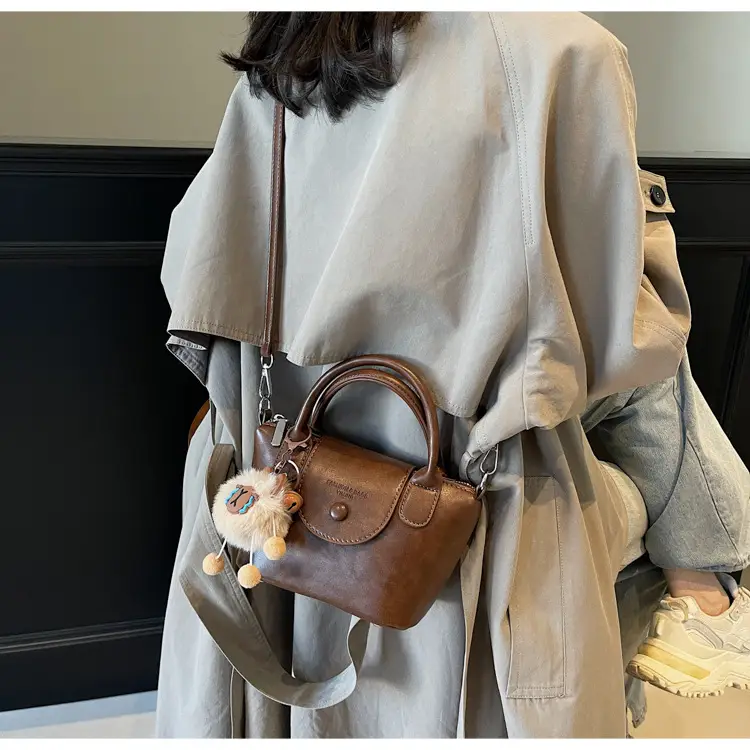 Women's Black Leather Shoulder Bag with Cute Pom Pom Charm — feature 40