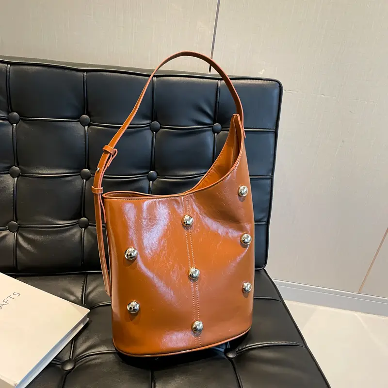 Women's Rivet Bucket Bag Brown Winter 2024