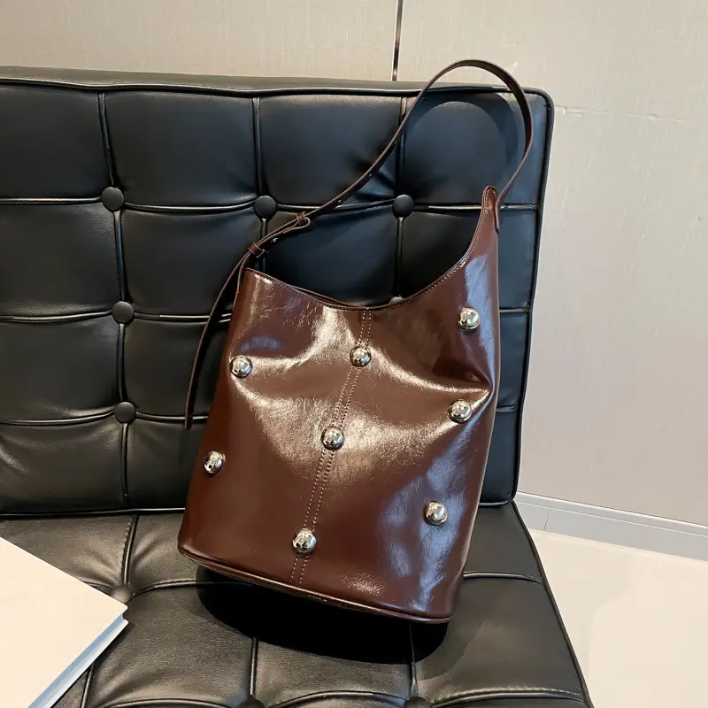 Women's Rivet Bucket Bag Brown Winter 2024