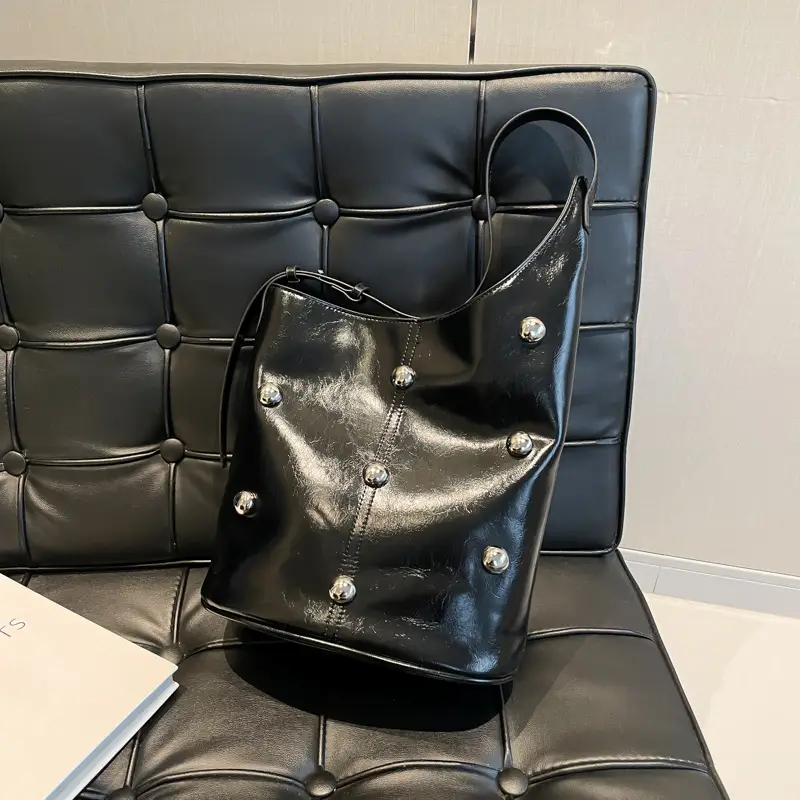 Women's Rivet Bucket Bag Brown Winter 2024