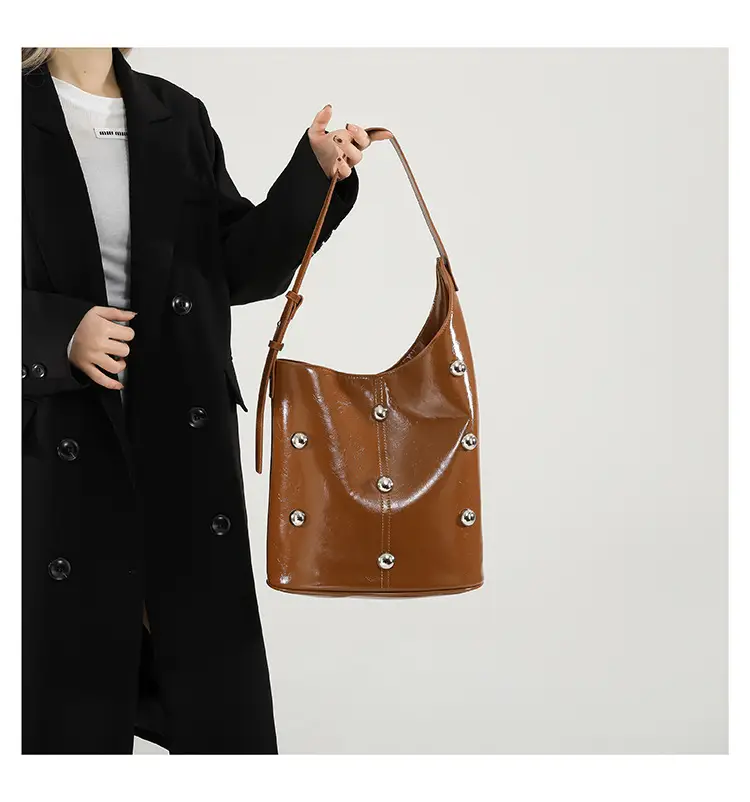 Women's Rivet Bucket Bag Brown Winter 2024 — feature 16