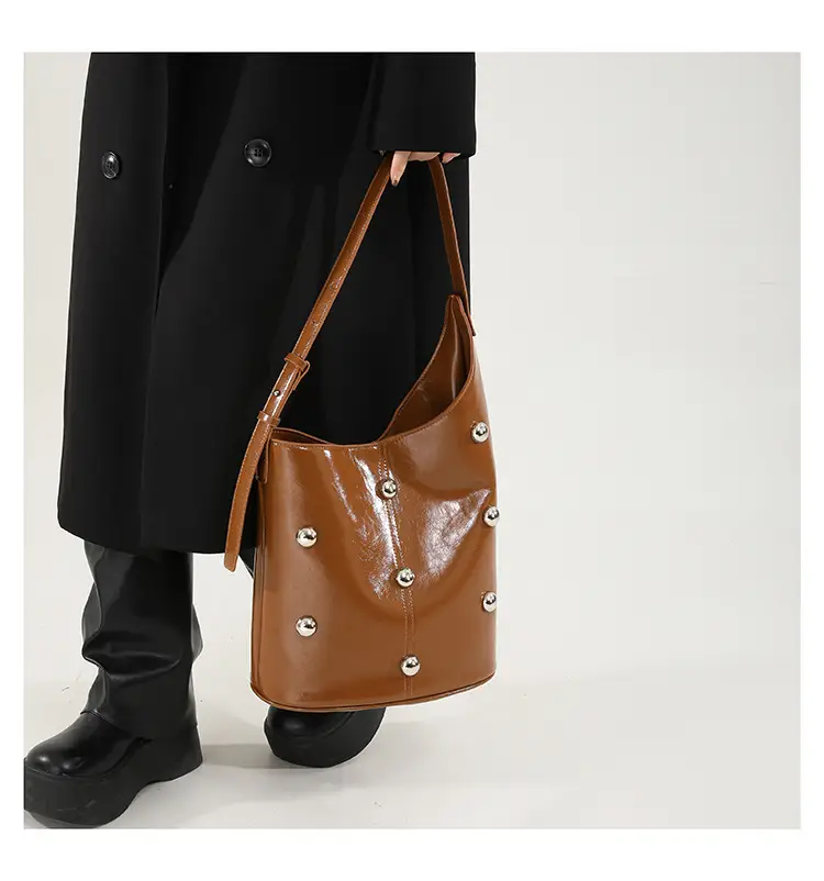Women's Rivet Bucket Bag Brown Winter 2024 — feature 17