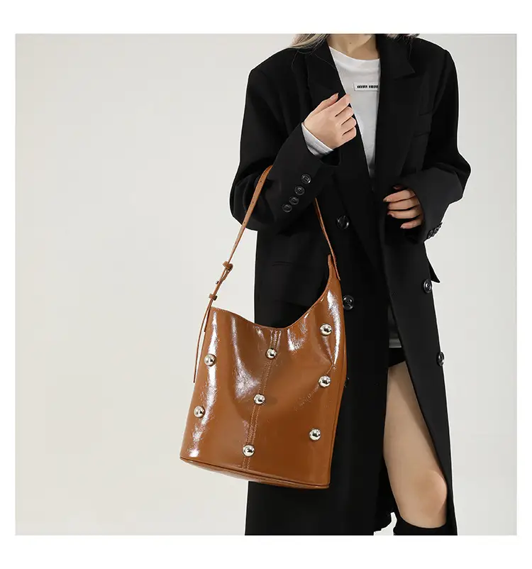 Women's Rivet Bucket Bag Brown Winter 2024 — feature 18