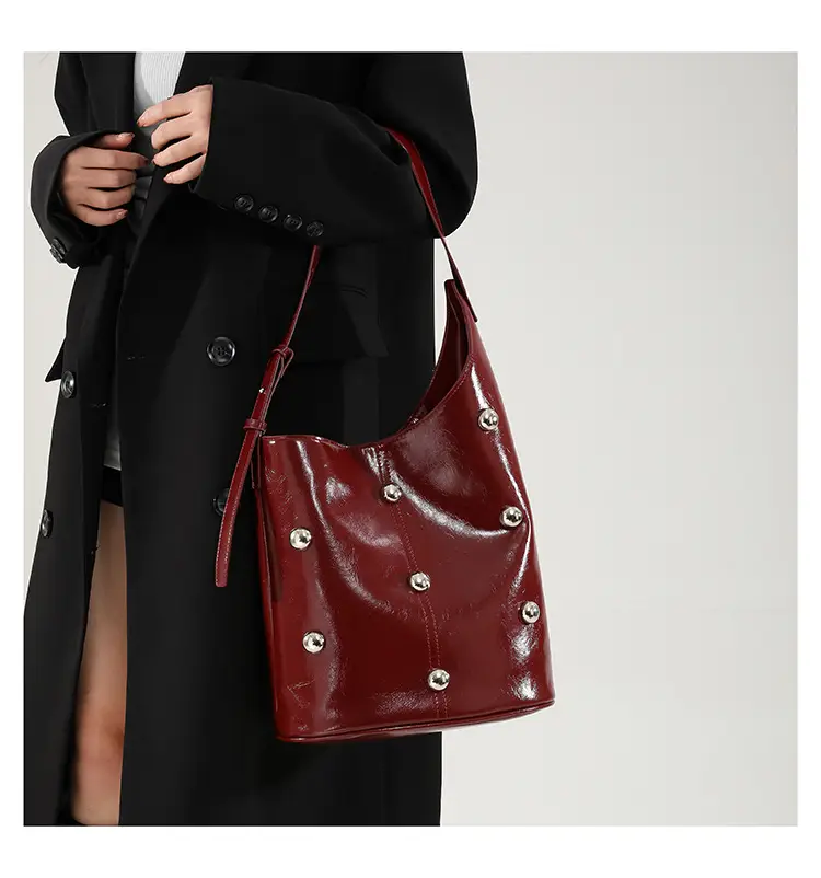 Women's Rivet Bucket Bag Brown Winter 2024 — feature 19