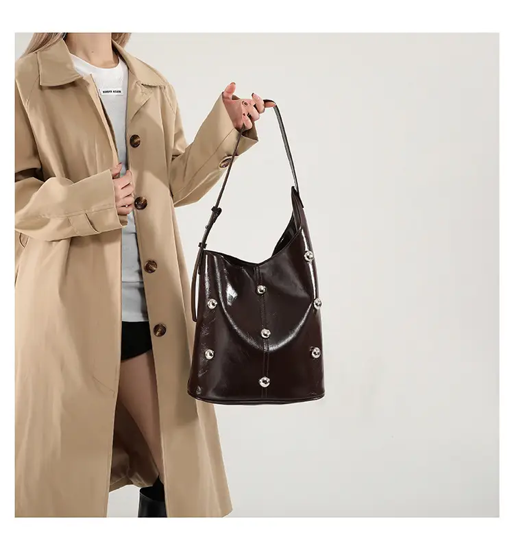 Women's Rivet Bucket Bag Brown Winter 2024 — feature 21