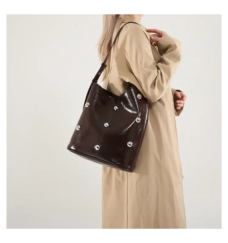 Women's Rivet Bucket Bag Brown Winter 2024 — feature 23