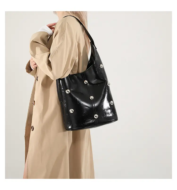 Women's Rivet Bucket Bag Brown Winter 2024 — feature 24