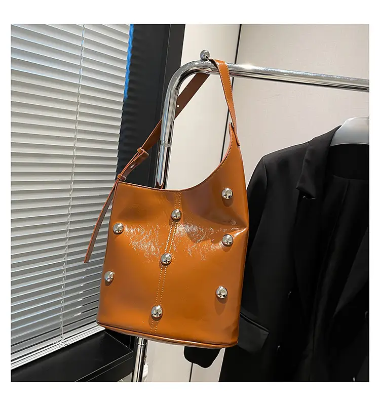 Women's Rivet Bucket Bag Brown Winter 2024