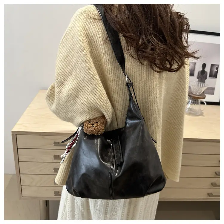 Vintage Brown Leather Shoulder Tote Bag with Pom Pom — feature 17