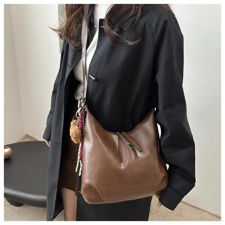 Vintage Brown Leather Shoulder Tote Bag with Pom Pom — feature 9