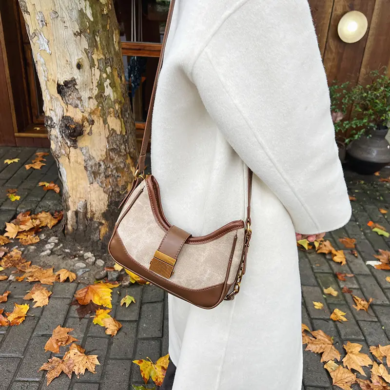 Black Chain Lock Crossbody Bag with Patchwork Design — feature 33