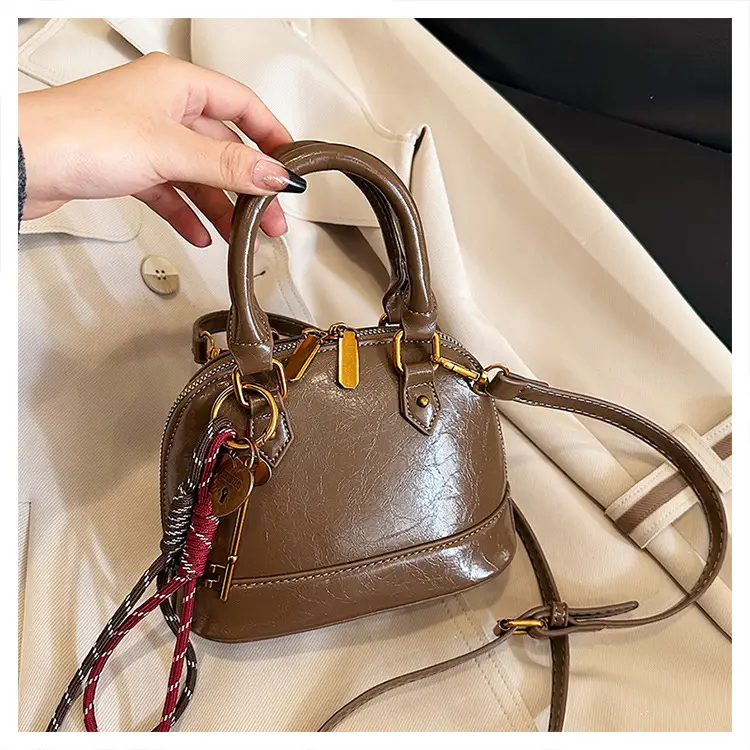 Women's 2024 Brown Leather Shoulder Crossbody Bag with Gold Hardware — feature 24