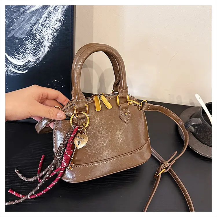 Women's 2024 Brown Leather Shoulder Crossbody Bag with Gold Hardware — feature 28