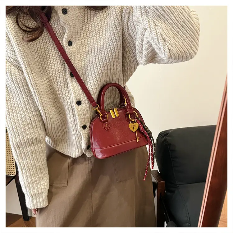 Women's 2024 Brown Leather Shoulder Crossbody Bag with Gold Hardware — feature 40