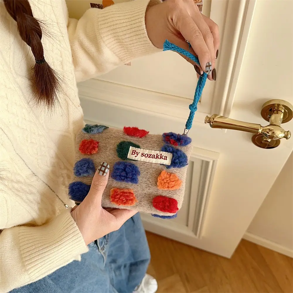 Fashionable Plush Crossbody Bag for Women with Colorful Pom Pom Design - Image 11