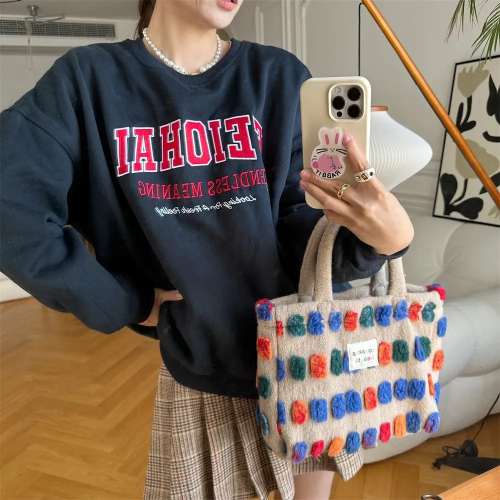 Fashionable Plush Crossbody Bag for Women with Colorful Pom Pom Design — feature 16