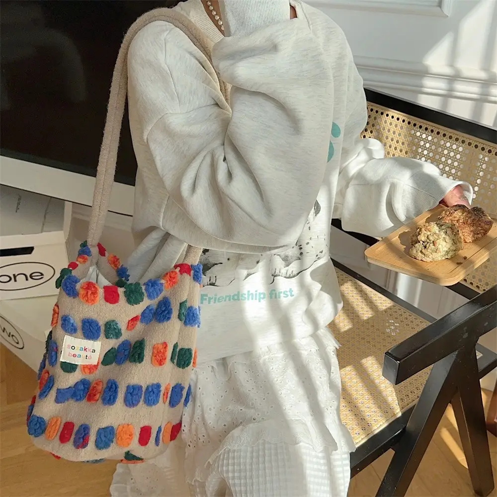 Fashionable Plush Crossbody Bag for Women with Colorful Pom Pom Design — feature 8