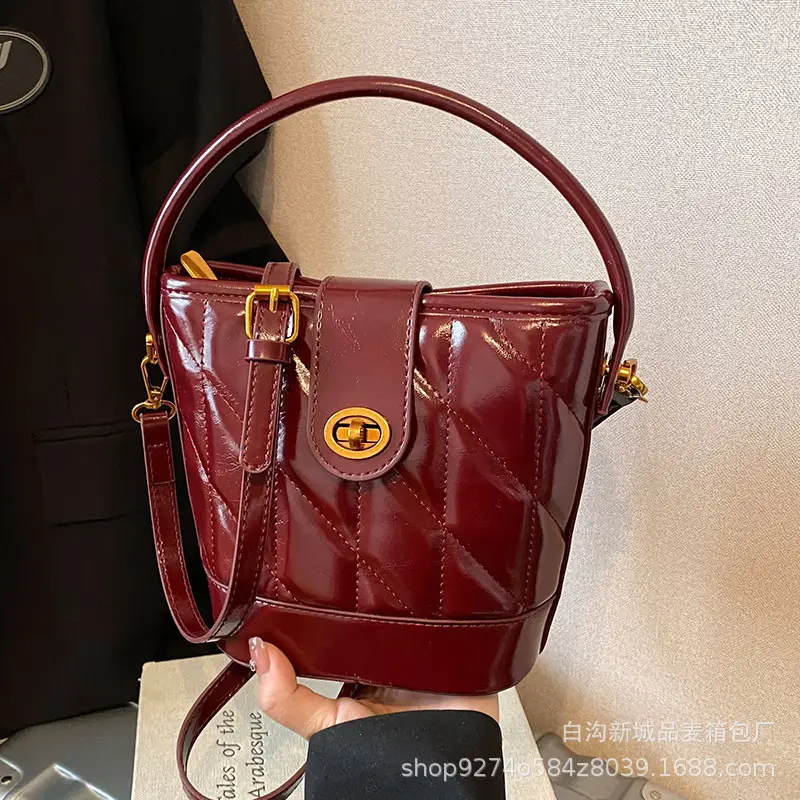 2026 Winter Quilted Black Bucket Bag with Gold Logo - Image 5