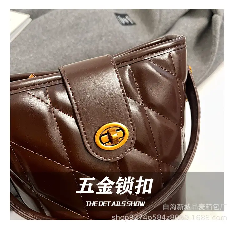2026 Winter Quilted Black Bucket Bag with Gold Logo — feature 11