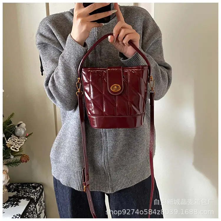 2026 Winter Quilted Black Bucket Bag with Gold Logo — feature 13